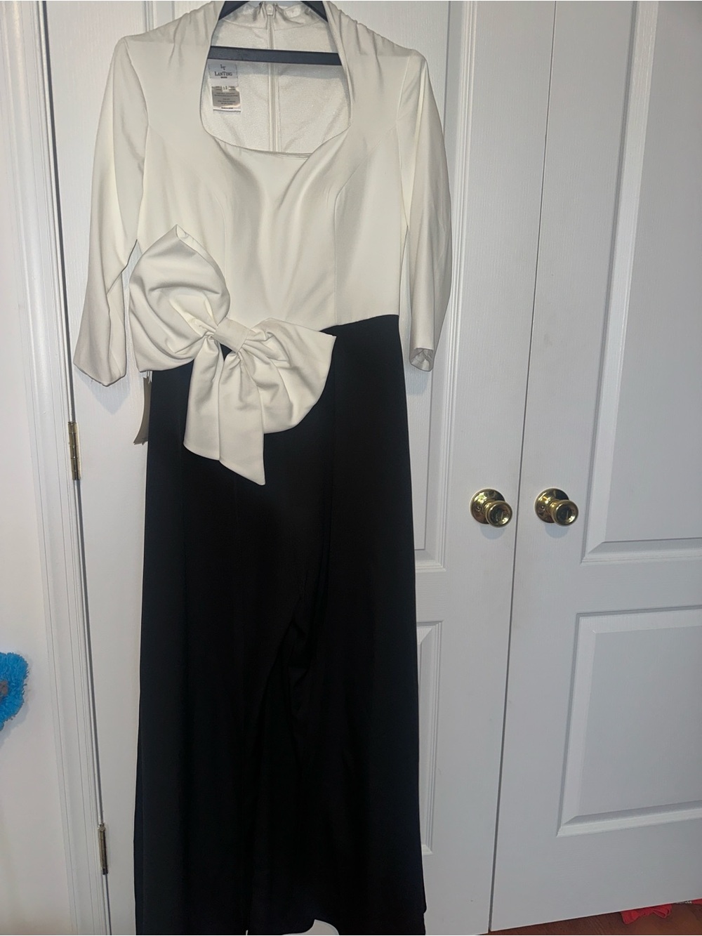 Elegant Two-Tone White & Black Jumpsuit with Bow Detail